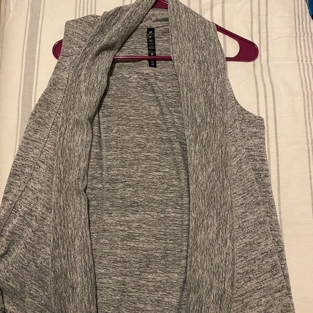 Sleeveless Yoga cardigan.